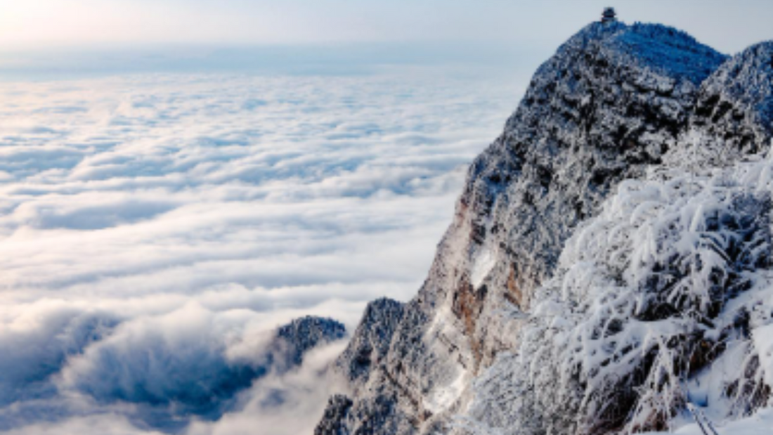 snowy scenery with sea of cloud from the top of emei mount in winter