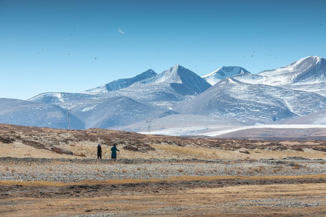 two pilgrims in thier journey to the sacred mountain